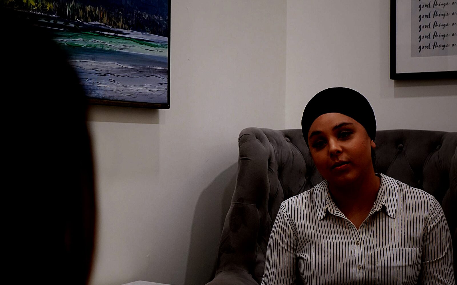 A coach and client in a focused one-to-one conversation