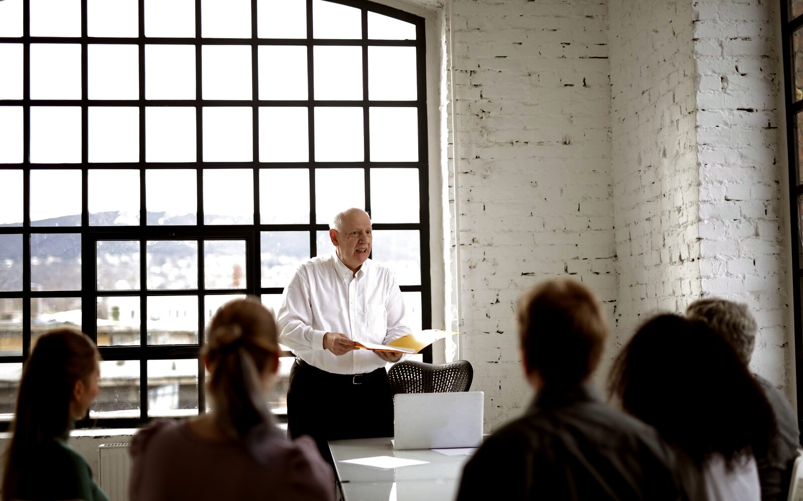 A facilitator leading a leadership group session