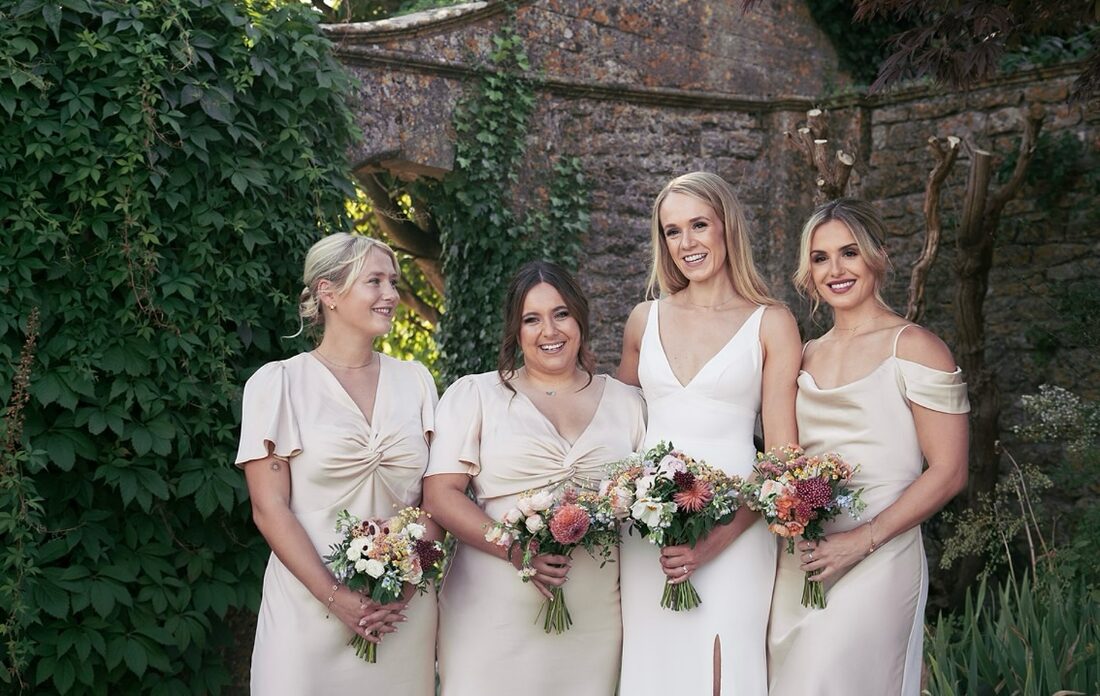 Bridesmaids ready in the garden