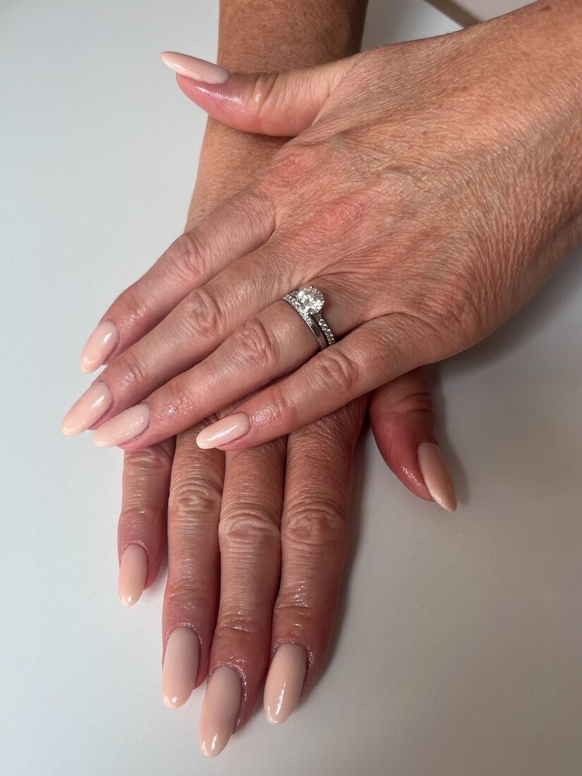 Bridal manicure with engagement ring